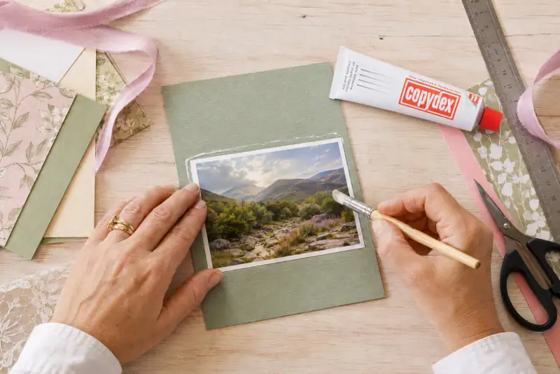 Copydex adhesive mounting a photo onto card for scrapbooking UK